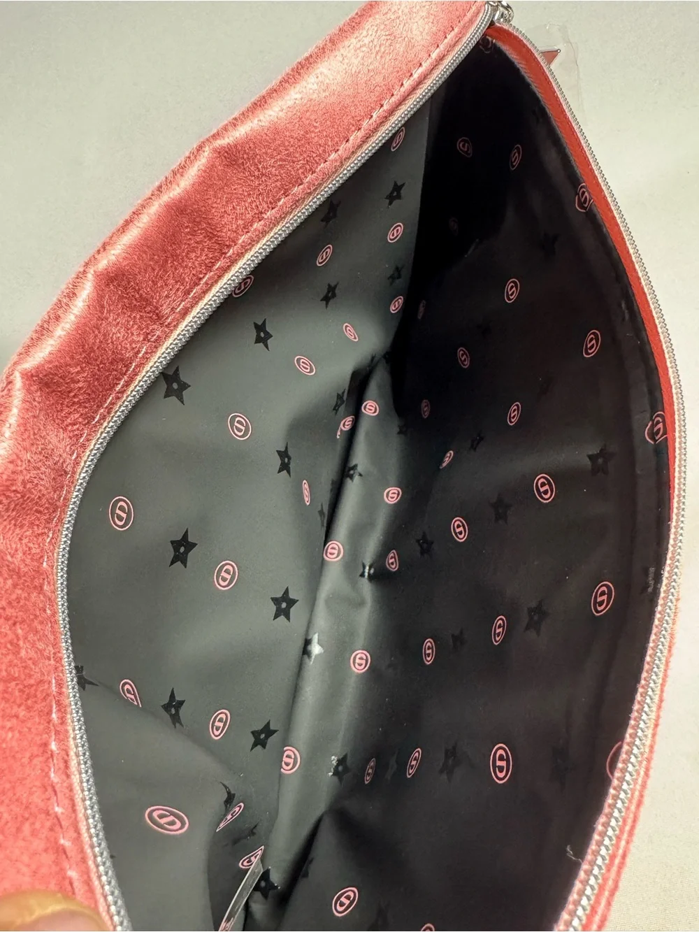 Dior Pink Embossed Logo Wristlet with Silver Star Charm